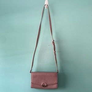 Pink crossbody bag. Fits phone, 4 card pouches, money pouch, small zipper pouch
